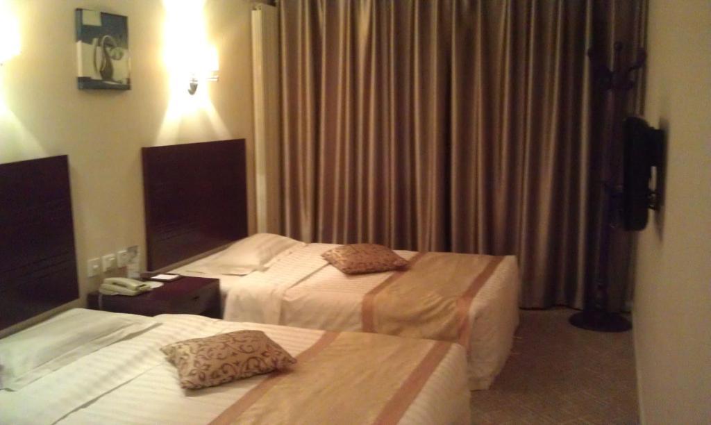 Dajiaoting International Business Hotel Peking Rum bild